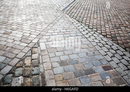 attractive pattern of cobblestone pavement in the city Stock Photo