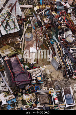 Top view of a junkyard with a chaotic load of wasted trash Stock Photo