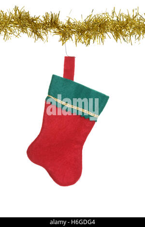 Christmas stocking hanging on gold garland Stock Photo