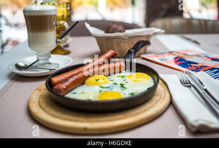 scrambled eggs with sausages Stock Photo