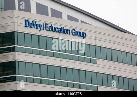 A logo sign outside of the headquarters of the DeVry Education Group in Downers Grove, Illinois on October 15, 2016. Stock Photo