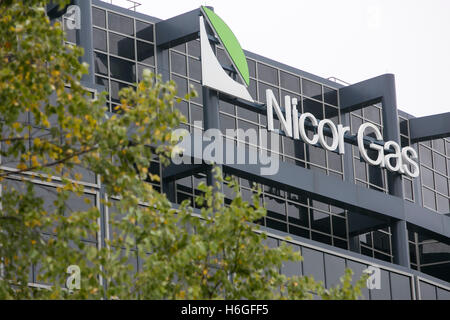 A logo sign outside of the headquarters of Nicor Gas in Naperville, Illinois on October 15, 2016. Stock Photo