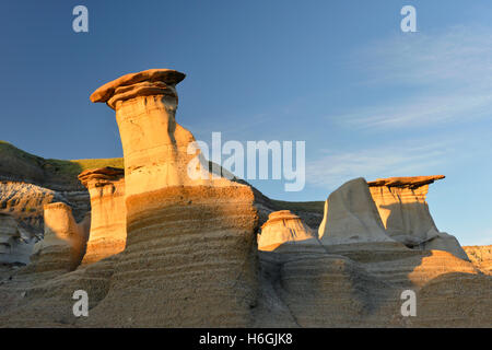 Geological formations known as 'hoodoos'; the result of erosion. Drumheller, Alberta, Canada. Stock Photo