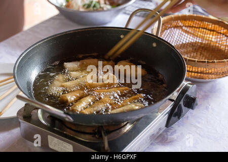 spring roll (food, thai, spring) while cooking Stock Photo