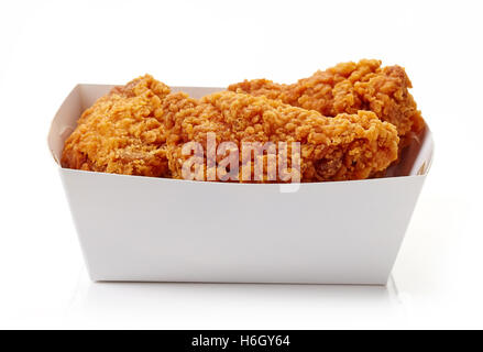 Fried breaded chicken wings in white cardbord box isolated on white background Stock Photo