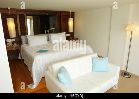 HERAKLION, CRETE, GREECE - MAY 13, 2014: Interior room with big bed and bath in modern building of luxury class hotel Stock Photo