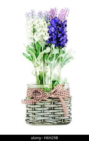 Composition of artificial garden flowers in decorative vase isolated on white background. Stock Photo