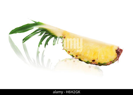 Quarter cut of ripe whole pineapple isolated on white background. Stock Photo