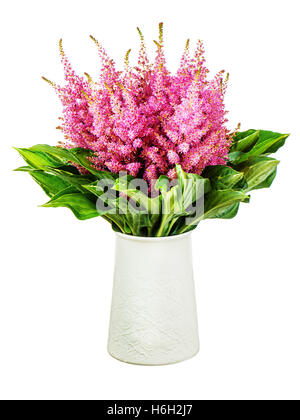 Colorful bouquet from astilbe and funkia flowers in vase isolated on white background. Closeup. Stock Photo