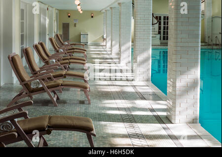 Chaise Lounges; interior spring-fed swimming pool; Omni Bedford Springs Resort & Spa; Bedford; Pennsylvania; USA Stock Photo