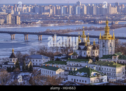 Panoramic view of Kiev Pechersk Lavra Monastery in winter. The Dnieper River, Paton Bridge, Church of the Nativity of the Virgin Stock Photo