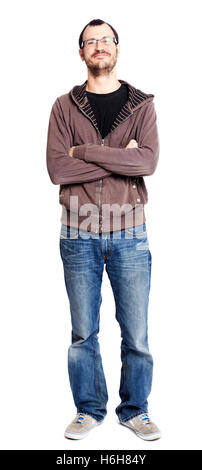 An adult caucasian man at his early 30's wearing casual sneakers, a pair of blue jeans and a hoodie over a black t-shirt. He's l Stock Photo