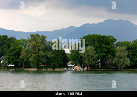 View to the Fraueninsel ( Island ) and Monastery Church with the Kampenwand in the background, Chiemsee Chiemgau, Bavaria Stock Photo