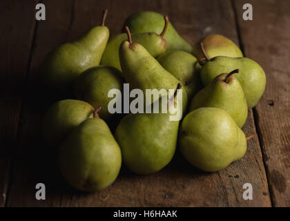 Still life of ripe Bartlett pears in subdued lighting Stock Photo