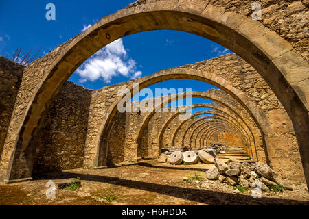 Arches at an old olive-press factory at Agios Georgios (Saint George) monastery, Karydi, Apokoronas, Chania, Crete, Greece. Stock Photo