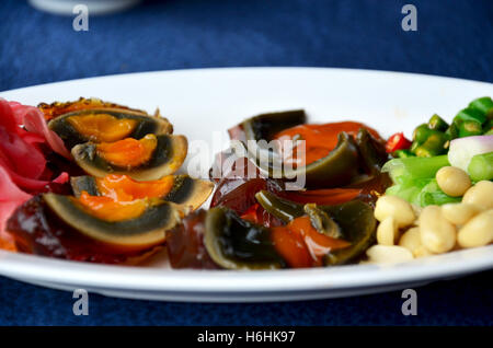 Appetizer century egg or pidan also known as preserved egg, hundred-year egg, thousand-year egg, thousand-year-old egg, and mill Stock Photo