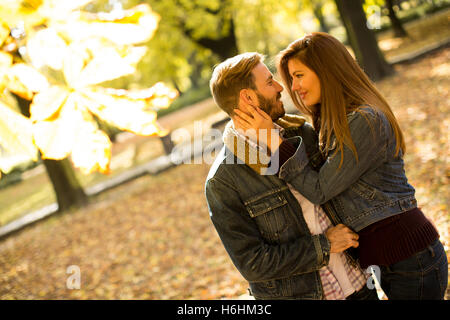 Loving couple in the autumn park Stock Photo