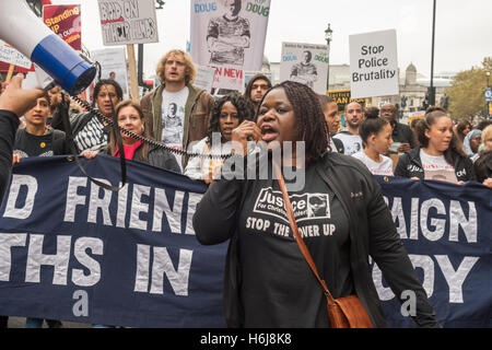 London, UK. 29th October 2016. Janet Alder whose sone Christopher Alder died on the floor of a police station in Hull in April 1998 leads the march by Families and friends of people killed by police or in prisons  from Trafalgar Square to Downing St, where they will deliver a letter to Theresa May and hold a rally with speakers from the families of some of those who have died. Peter Marshall/Alamy Live News Stock Photo