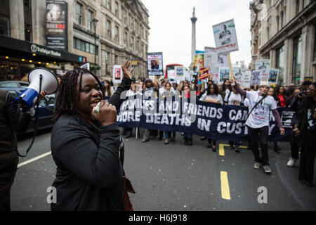 London, UK. 29th October, 2016. Janet Alder, sister of Christopher Alder, addresses campaigners from the United Families and Friends Campaign (UFFC) during their annual procession to Downing Street in remembrance of family members and friends who died in police custody, prison, immigration detention or secure psychiatric hospitals. Christopher Alder, 37, died handcuffed and face down surrounded by police officers in a Hull police station in April 1998 after choking on his own vomit. Credit:  Mark Kerrison/Alamy Live News Stock Photo