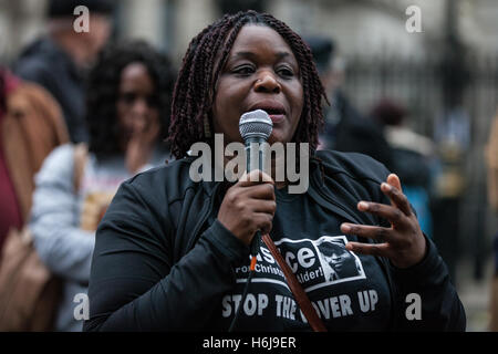 London, UK. 29th October, 2016. Janet Alder, sister of Christopher Alder, addresses campaigners from the United Families and Friends Campaign (UFFC) outside Downing Street following their annual procession. Christopher Alder, 37, died handcuffed and face down surrounded by police officers in a Hull police station in April 1998 after choking on his own vomit. Credit:  Mark Kerrison/Alamy Live News Stock Photo