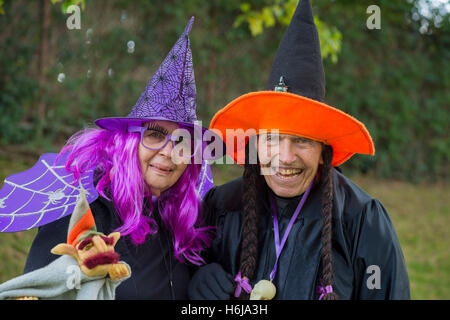 Merrick, New York, USA. 29th Oct, 2016. BETTY TUCKER and her husband LENNY TUCKER, of Merrick, are dressed in witches costumes at the 2016 annual Merrick Spooktacular hosted in part by the North and Central Merrick Civic Association (NCMCA). Betty is a member of the Merrick American Legion Auxilliary 1282, and Marty is a member of the American Legion Post 1282, which sponsored the holiday party at Fraser Park. © Ann Parry/ZUMA Wire/Alamy Live News Stock Photo