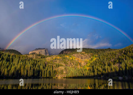 Rainbow over Bear Lake and Hallett Peak, Rocky Mountain National Park, Colorado USA Stock Photo