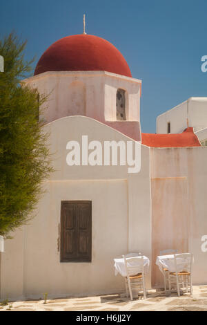 Red domed Greek Orthodox church in Mykonos Stock Photo