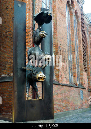 RIGA, LATVIA-SEPT. 26: The Bremen Town Musicians statue is seen in the historic district of Riga, Latvia, Europe on September 26 Stock Photo