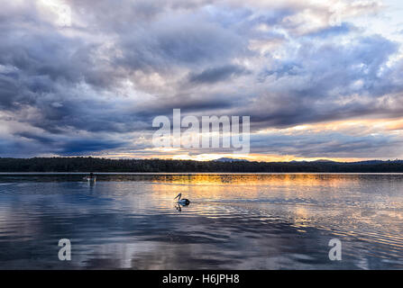 Sunset and threatening clouds over Wallaga Lake, near Bermagui, New South Wales, Australia Stock Photo