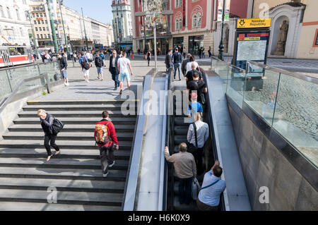 Metro passengers on the escalator and steps in Náměstí Republiky ( Republic Square) in Prague, Czech Republic. Stock Photo
