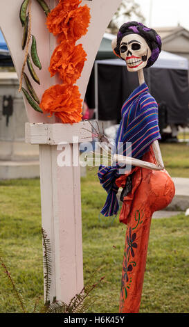 Flower and skeleton dog, cat and bird alter at Dia de los Muertos, Day of the dead, in Los Angeles at the Hollywood Forever Ceme Stock Photo