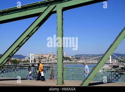 Liberty Bridge (Szabadsag hid), crossing the River Danube, with Elizabeth Bridge and the Royal Palace in the background, Budapest, Hungary Stock Photo