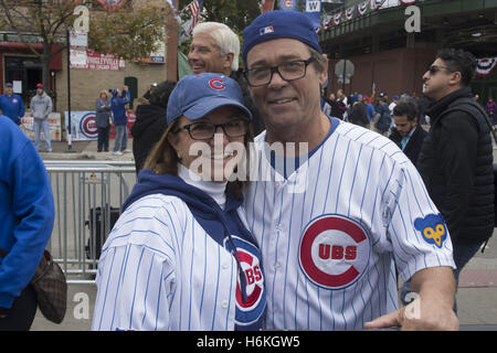 Chicago Cubs broadcasters Ron Santo (L) and Pat Hughes pose for a  photograph in the broadcast booth before a game against the St. Louis  Cardinals at Busch Stadium in St. Louis on