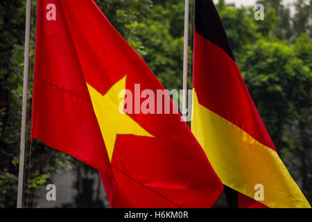 Hanoi, Vietnam. 31st Oct, 2016. The flags of Vietnam (L) and Germany wave during bilateral talks between the German and Vietnamese Foreign Ministers outside the Ministry of Foreign Affairs in Hanoi, Vietnam, 31 October 2016. German Minister of Foreign Affairs rank-Walter Steinmeier is visiting the Socialist Republic of Vietnam during a three-day trip. Photo: GREGOR FISCHER/dpa/Alamy Live News Stock Photo