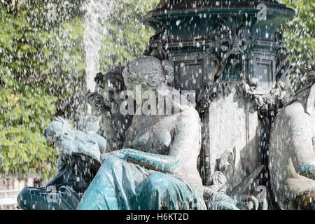 Fountain on Rossio square (Pedro IV Square) in Lisbon, Portugal Stock Photo