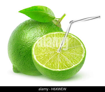 Isolated lime juice. One and a half lime fruit with straw in it, natural fresh juice concept isolated on white background with c Stock Photo