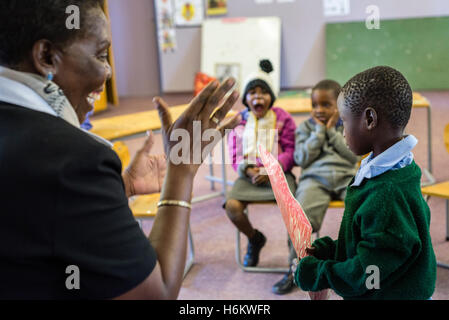 The teacher Josephina Hangula has a lesson with the orientation group for hearing impaired children at Eluwa Special School in Ongwediva Stock Photo