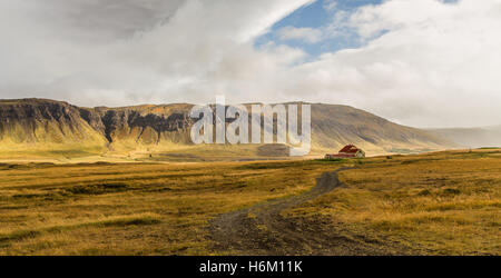 A road leading to a farmhouse in Northwest Iceland Stock Photo