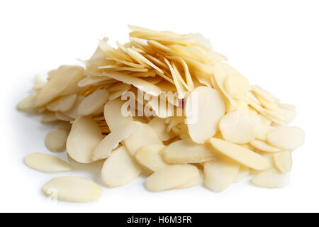 Pile of peeled flaked almonds isolated on white. Stock Photo
