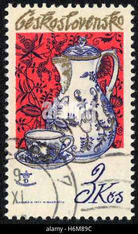 A postage stamp printed in Czechoslovakia, shows Jug and teacup, circa 1977 Stock Photo