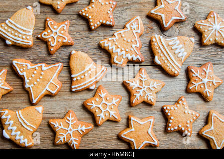 Christmas gingerbread cookies on wooden table - Christmas homemade festive bakery Stock Photo