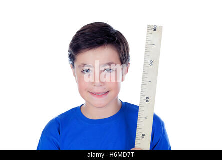 Ten year old boy with a meter of wood isolated on white background Stock Photo