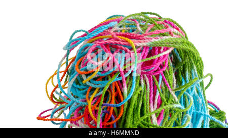 Tangled colorful sewing threads on white background. Stock Photo