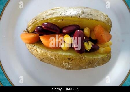 Jacket Potato with Red Kidney Beans, Carrot and Sweetcorn Stock Photo