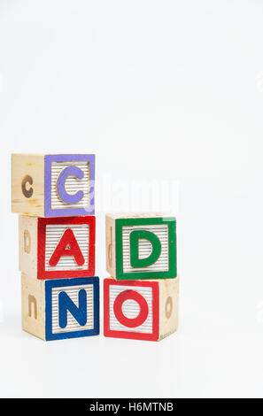 CAN DO word wooden block arrange in vertical style on white background and selective focus Stock Photo