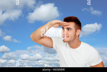 Handsome youn men looking on a beautiful sky of background Stock Photo