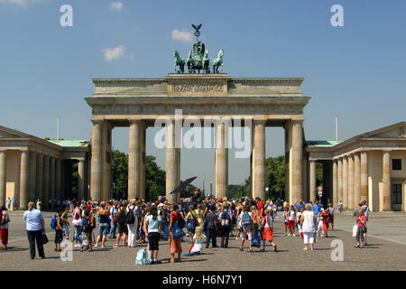 tourists in front of the brandenburg gate Stock Photo