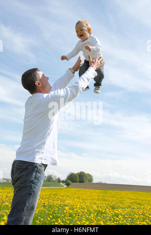 proud father -child uphold - Stock Photo