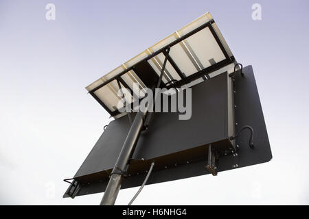 Rear view of a mobile, solar powered dot-matrix road sign Stock Photo