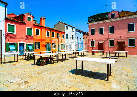 Venice landmark, Burano old market flea square, colorful houses, Italy, Europe. Stock Photo